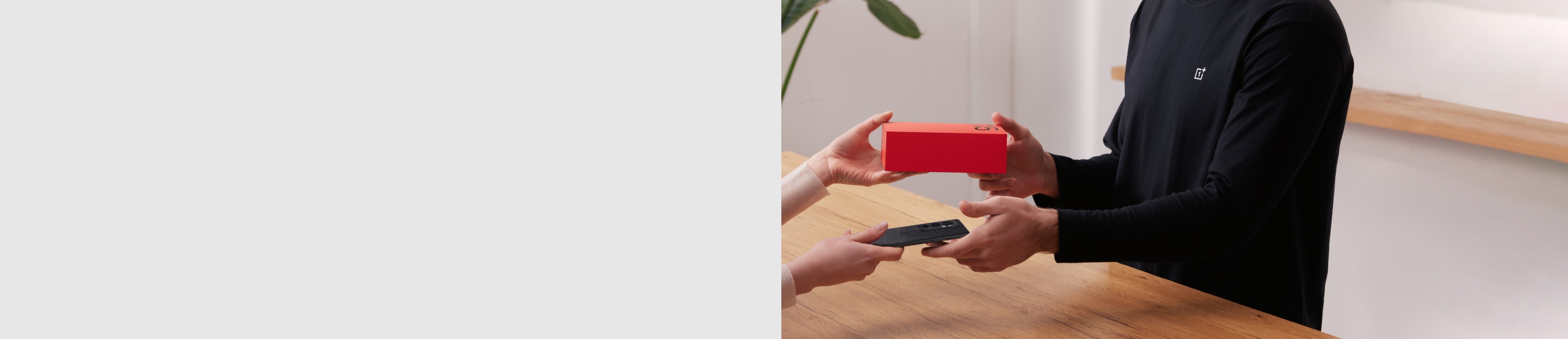 Dark blue rectangular game controller with red cable.