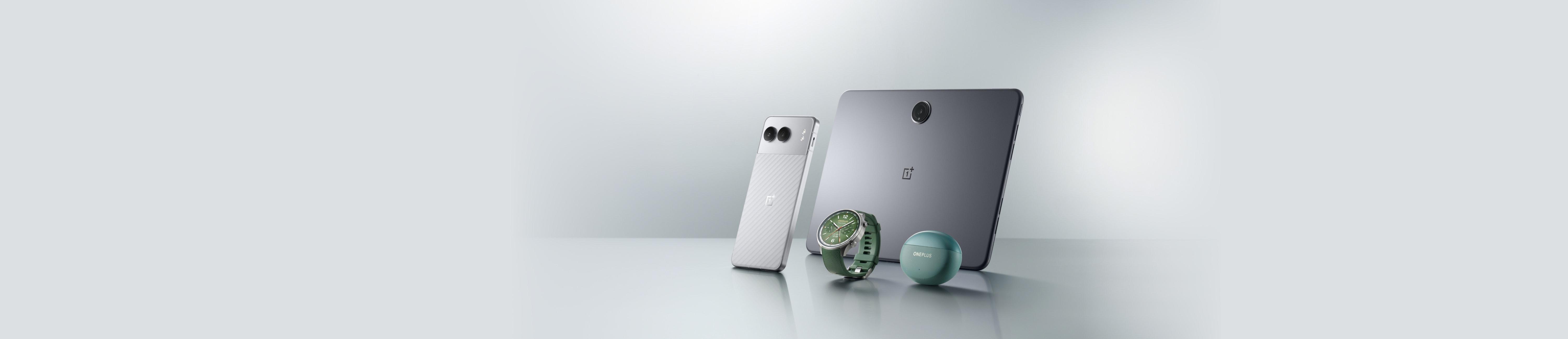 Silver, sleek electronic devices on a white background