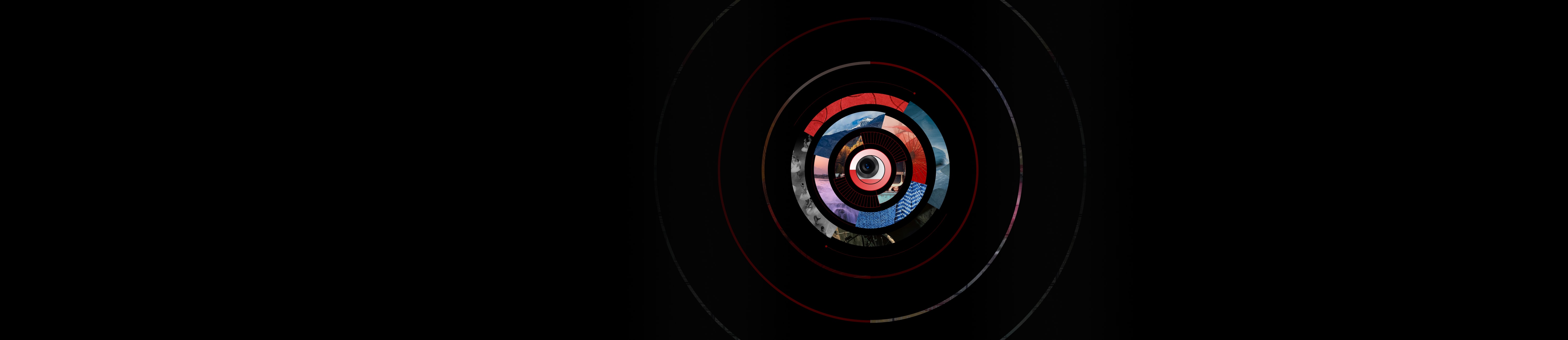 Concentric colorful circles on a dark background.